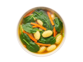 Isolated bowl of gnocchi soup with fresh spinach leaves and carrot strips, close-up view
