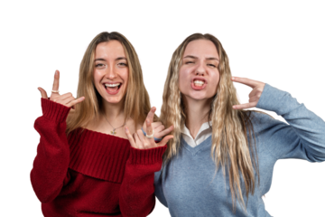 Two young women making silly faces, having fun