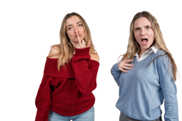 Woman making offensive gesture shocking friend