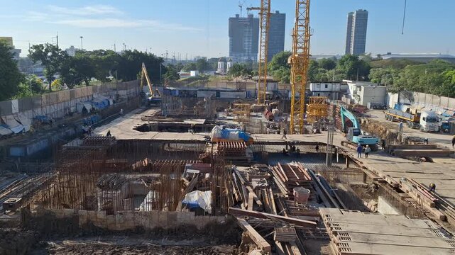 High angle view shows Workers constructing concrete Pathum Thani, Thailand, December 8, 2025