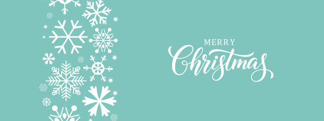 Elegant Merry Christmas greeting card with white snowflakes on  blue background, modern calligraphy text, festive winter holiday banner, minimalist horizontal layout, copy space for seasonal