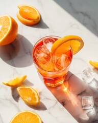 Refreshing Aperol Spritz cocktail with orange slices and ice on white marble for summer beverage menu, bar promotion, restaurant branding, lifestyle content

