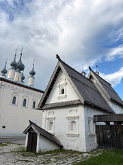View of residential house of XVII century and Smolenskaya church. Suzdal town, Vladimir Oblast, Russia