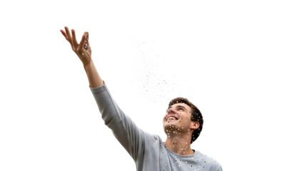 A man looking up with happiness and joy with raised arms