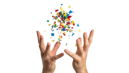A person's hands catching colorful confetti, celebrating a festive moment. The vibrant confetti and open hands capture the excitement and celebration