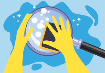 Hands in a yellow rubber gloves with cleaning sponge&nbsp;washing a&nbsp;Magnifying Glass on a blue background.