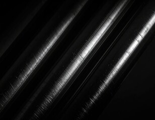 Angled pipes/tubes reflect light in dark environment