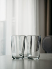 Two glass cups on the table