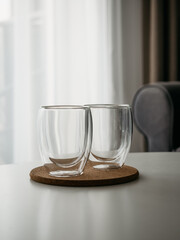 Two glass cups on the table