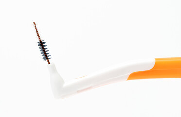 Interdental Brush Macro Photography on White Background