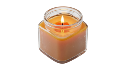 Burning orange candle in glass jar isolated PNG, aromatherapy wax light for relaxation and home decor on transparent background