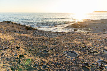 Sunset on Cane Malu beach in Sardinia.