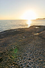 Sunset on Cane Malu beach in Sardinia.