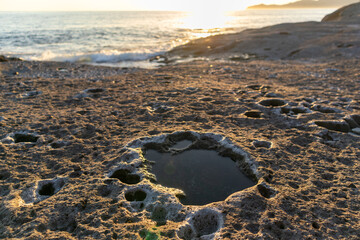 Sunset on Cane Malu beach in Sardinia.