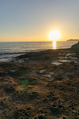 Sunset on Cane Malu beach in Sardinia.