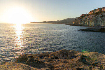 Sunset on Cane Malu beach in Sardinia.