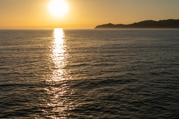 Sunset on Cane Malu beach in Sardinia.