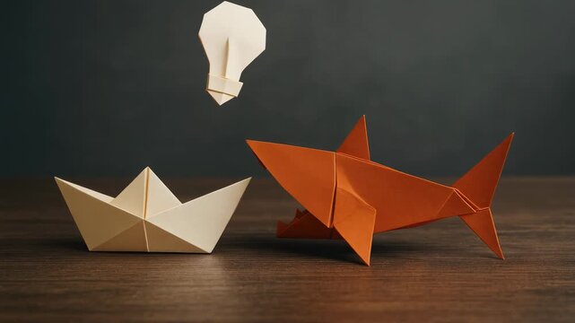 Survival challenge solution success origami shark paper boat and paper light bulb staged on wooden surface representing business risk creative idea and resourceful strategy