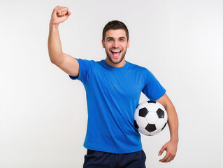 Happy man celebrating victory holding soccer ball