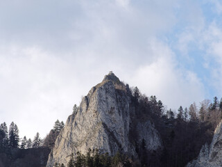 Sokolica peak with people on the top, Pieniny Mountain, Poland. Pieniny National Park. View from Dunajec River Gorge