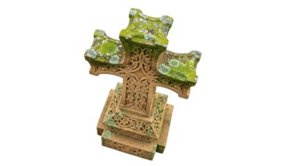Isolated weathered stone cross monument outdoors, lichen growing on it, detailed carving