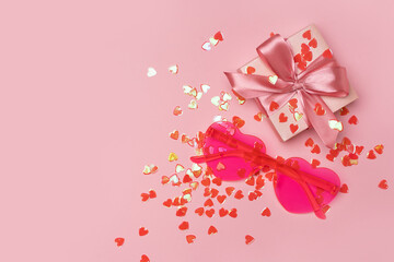 Bright pink heart shape glasses and gift box