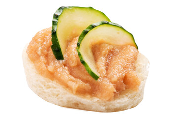 canape.made of bread and spreads with caviar and vegetables, decorated with microgrin.Festive snack on white background