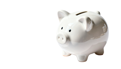 Ceramic piggy bank with coin slot, symbolizing savings and personal finance, isolated on white.