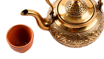 Traditional Arabic Dallah coffee pot with a small cup, a symbol of Ramadan hospitality. Isolated on white background.