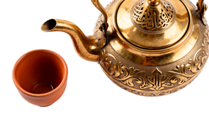 Traditional Arabic Dallah coffee pot with a small cup, a symbol of Ramadan hospitality. Isolated on white background.