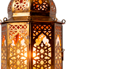 Traditional Metal Ramadan Fanous Lantern with Intricate Cut-out Patterns, Evoking Warm Spiritual Ambiance, Isolated on White