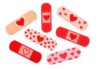 Assortment of heartshaped adhesive bandages isolated on transparent background