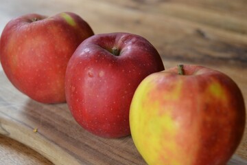 apples on a wooden table
