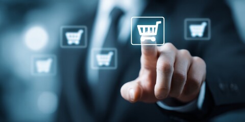 Fototapeta premium Man in suit touching digital icons with e-commerce symbols, showcasing online shopping concepts, on light blue blurred background with focus on cart icon
