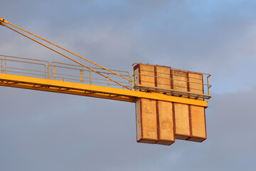 Large concrete slabs are used to counterweight cranes in construction.