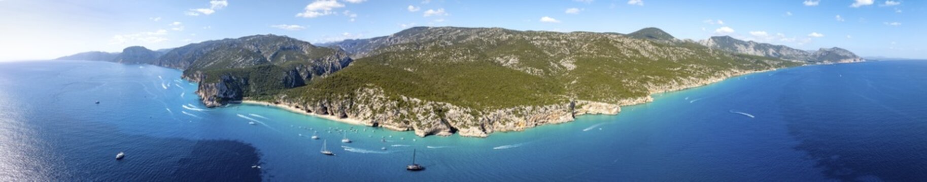 Panorama, picturesque rocky coast, cliffs and Cala Luna beach, aerial view, Golfo di Orosei, Baunei, Sardinia, Italy