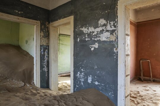 At Kolmanskop, the abandoned ghost town of the diamond days of the early 1900 and of German origin. Inside the restricted Diamond Area east of the coastal town of L&uuml;deritz. Namib Desert, Namibia