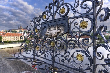 Bronze relief, Saint Nepomuk falling over the bridge, laying hands on the relief is said to bring good luck, Charles Bridge, Prague, Bohemia, Czech Republic