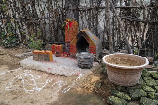 House altar with rangoli patterns and tilaka, Tindivanam-Boodheri, Tamil Nadu, India
