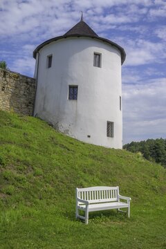 Tower of the fortified village and white bench, Žumberk u Nov&yacute;ch Hradů, South Bohemia, Czech Republic