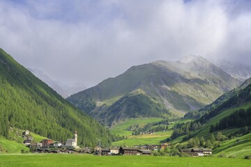 View of the village with freshly snow-covered mountains, Our Lady, South Tyrol, Italy