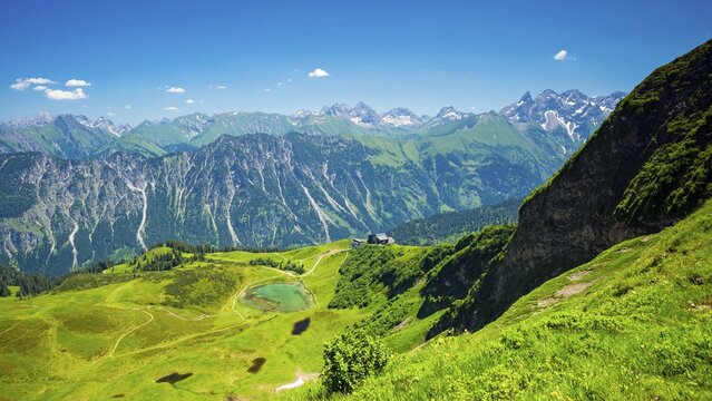 Panorama from the Fellhorn over the Schlappoldsee and Fellhornbahn mountain station to the central main ridge of the Allg&auml;u Alps, Allg&auml;u, Bavaria, Germany