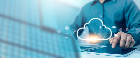 Cloud computing interface with digital icons hovering above a tablet, representing secure data storage, online connectivity, business analytics, modern technology solutions for digital transformation.