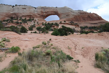 Wolken und der Wilson Arch im Canyon Country	