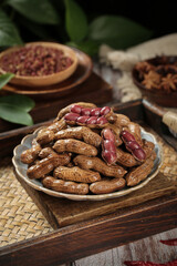 Boiled Peanuts and Red Beans on Rustic Wooden Plates - Traditional Healthy Snacks
