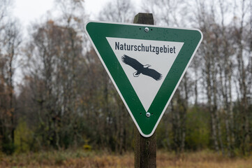 Information sign with the German word "Nature Reserve"