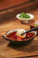 Shabu Shabu Meatball Hot Pot Experience with Spicy Dipping Sauce and Fresh Ingredients