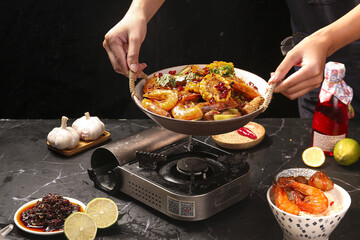 Homemade Spicy Shrimp and Vegetable Stir-Fry Cooking in Wok with Fresh Ingredients