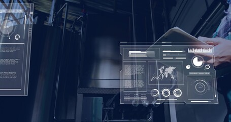 Projecting holo panels overlaying metal tanks in plant, man holding tablet, plaid shirt, copy space