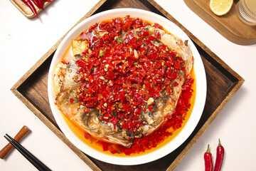 Spicy Steamed Fish Head with Red Chili Sauce Asian Cuisine Dish on Wooden Serving Tray